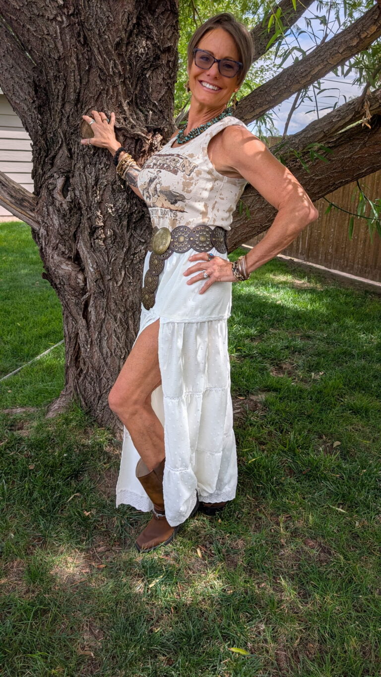 Gyl Bednarek, founder of The Diamond Reserve Mobile Bar, standing beside a tree.