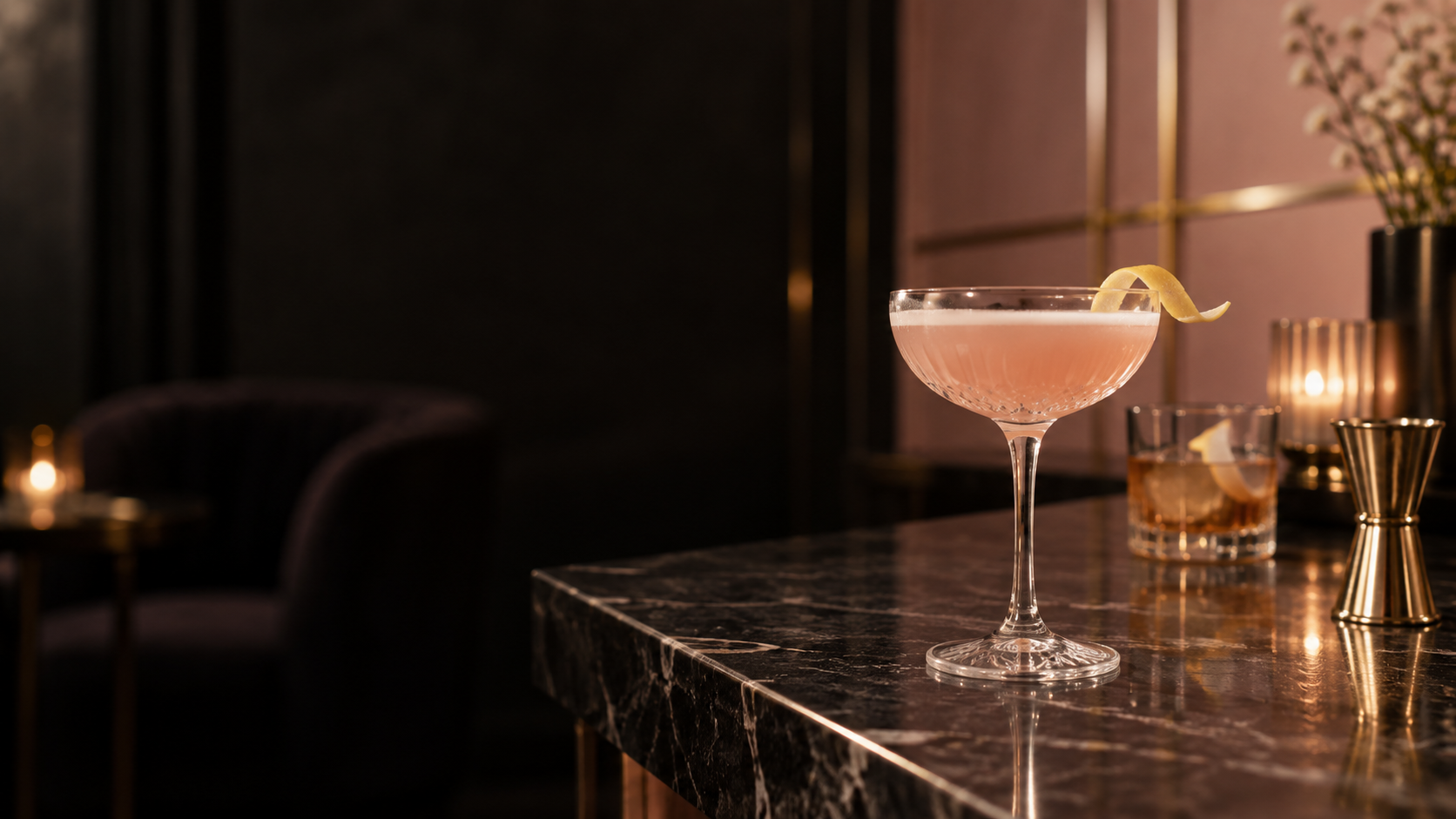 Cocktail concept featuring blush and amber drinks with gold barware.