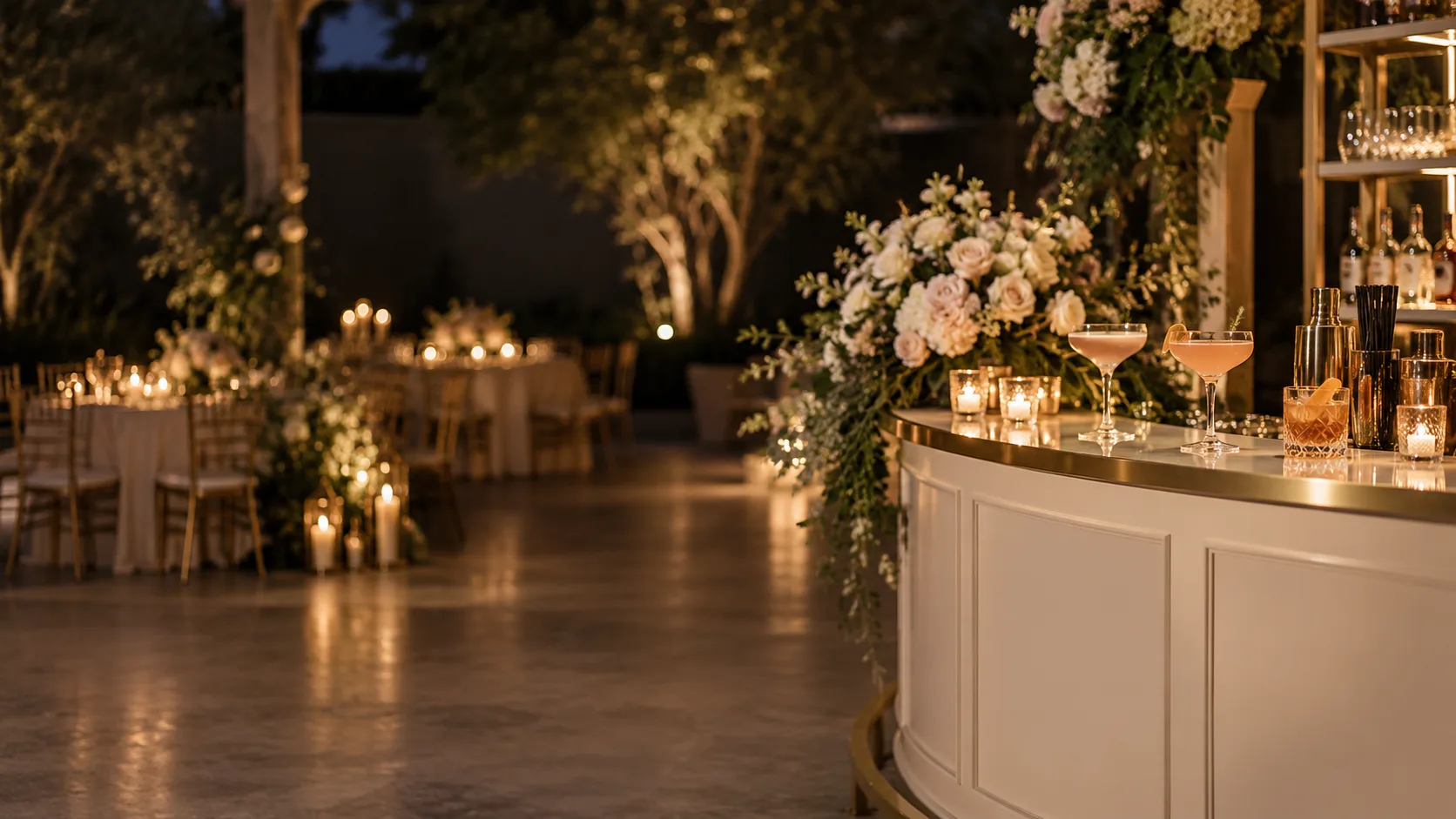 Illustrative wedding reception bar with ivory panels, blush florals, cocktails, and warm candlelight.